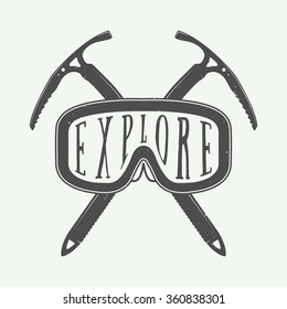 Vintage winter sports logo, badge, emblem and design elements with typography and mask. Vector illustration