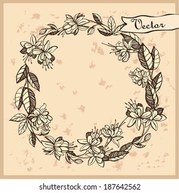 Vintage wreath with fuchsia flowers. 