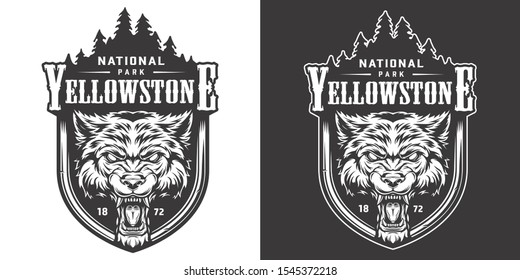 Vintage Yellowstone national park emblem with angry ferocious wolf head and forest landscape isolated vector illustration