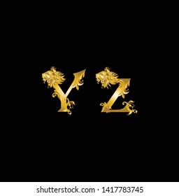 Golden​ vintage alphabet​Y, Z, decorate with lion head on black background 