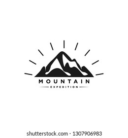 VINTAGE,EMBLEM,BADGE MOUNTAIN ADVENTURE LOGO. HIKING OUTDOOR DESIGN.
