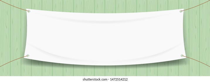 vinyl banner blank white isolated on wood green pastel color, white mock up textile fabric empty for banner advertising stand hanging, indoor outdoor fabric mesh vinyl backdrop for presentation frame