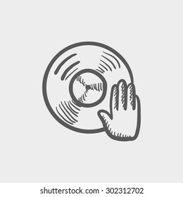 Vinyl disc with hand disc jockey sketch icon for web and mobile. Hand drawn vector dark grey icon on light grey background.