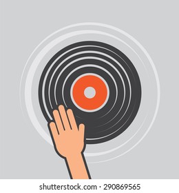 Vinyl record with hand scratching dj
