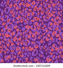 Violet and orange leopard background. Abstract seamless pattern. Spotted animal skin