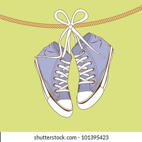 violet sneakers hanging of a rope over green background. vector