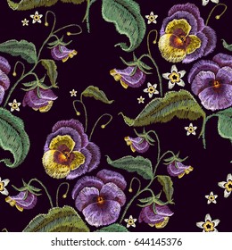 Violets flower embroidery seamless pattern.  Classical embroidery beautiful flowers of violet on black seamless background.  Fashionable template design of clothes 