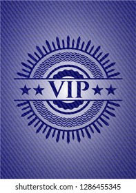 VIP badge with denim background