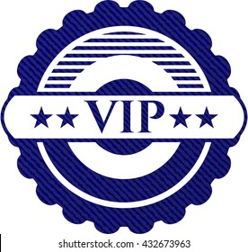 VIP badge with denim background