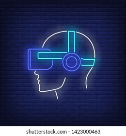 Virtual reality headset on head silhouette neon sign. Technology, innovation, gaming design. Night bright neon sign, colorful billboard, light banner. Vector illustration in neon style.