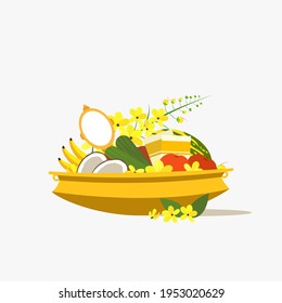 'Vishu Kani' an assortment of fruits, vegetables and other auspicious items in a bronze vessel. a symbol of 'Vishu' festival in Kerala, India