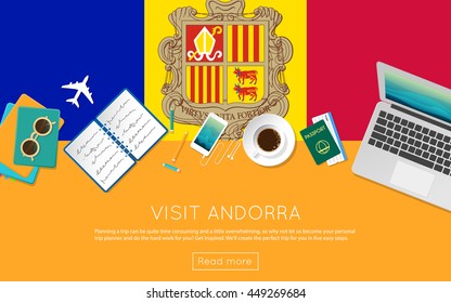 Visit Andorra concept for your web banner or print materials. Top view of a laptop, sunglasses and coffee cup on Andorra national flag. Flat style travel planninng website header.