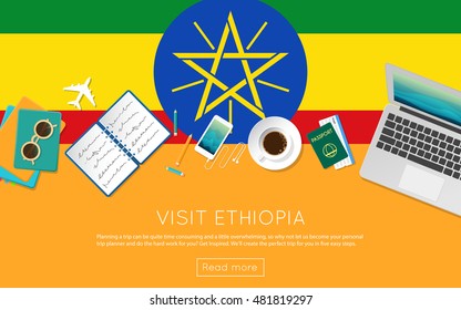 Visit Ethiopia concept for your web banner or print materials. Top view of a laptop, sunglasses and coffee cup on Ethiopia national flag. Flat style travel planninng website header.