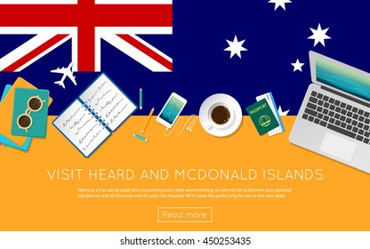 Visit Heard and McDonald Islands concept for your web banner or print materials. Top view of a laptop, sunglasses and coffee cup on Heard and McDonald Islands national flag.