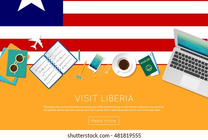 Visit Liberia concept for your web banner or print materials. Top view of a laptop, sunglasses and coffee cup on Liberia national flag. Flat style travel planninng website header.