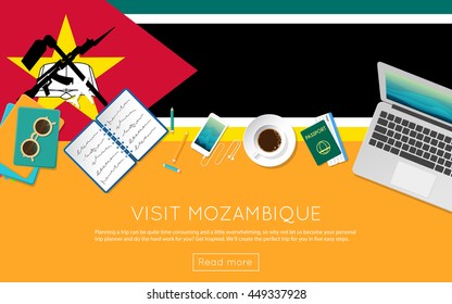 Visit Mozambique concept for your web banner or print materials. Top view of a laptop, sunglasses and coffee cup on Mozambique national flag. Flat style travel planninng website header.