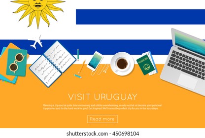 Visit Uruguay concept for your web banner or print materials. Top view of a laptop, sunglasses and coffee cup on Uruguay national flag. Flat style travel planninng website header.