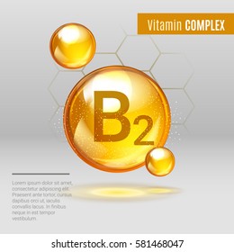Vitamin B 2 gold shining pill capcule icon . Vitamin complex with Chemical formula, group B, Riboflavin. Shining golden substance drop. Meds for heath ads. Vector illustration