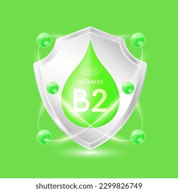 Vitamin B2 green drop inside aluminum shield with atom surround. Minerals and vitamins complex protect the body stay healthy. For nutrition products food. Vector EPS10 illustration.