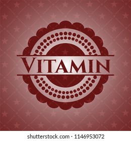 Vitamin badge with red background