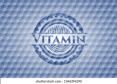 Vitamin blue emblem with geometric pattern.