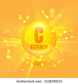 Vitamin C Gold Shining Light Pill. Capcule Icon On Orange Background