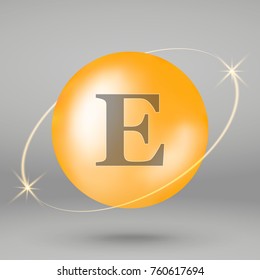 Vitamin E gold icon. drop pill capsule. Vitamin complex design