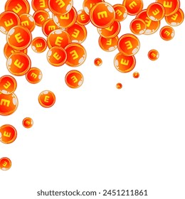Vitamin E round capsules scattered randomly.  Beauty treatment and nutrition skin care.   Medical and scientific background.  Wellness concept.