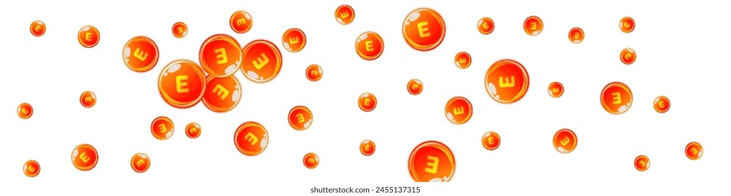 Vitamin E round capsules scattered randomly.  Beauty treatment and nutrition skin care.   Medical and scientific background.  Healthy life concept.