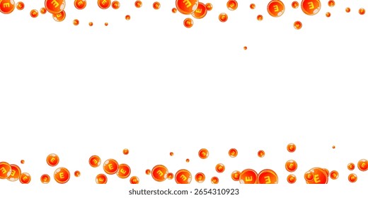 Vitamin E round capsules scattered randomly.  Beauty treatment and nutrition skin care.   Wellness concept. Medical and scientific background. 