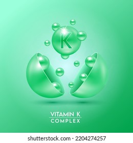 Vitamin K complex float out of the capsule isolated on green background. Vector EPS10.