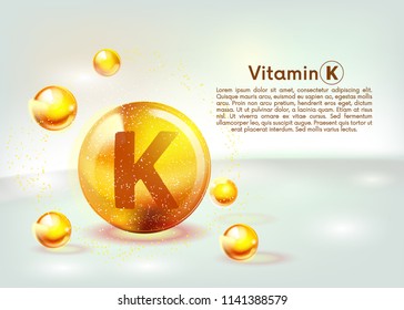 Vitamin K gold shining icon. Ascorbic acid. Shining golden substance drop. Nutrition skin care. Vector illustration.