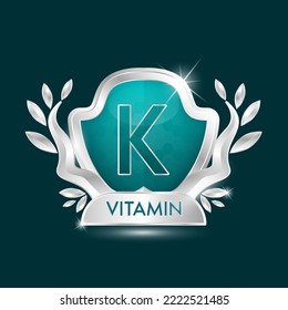 Vitamin K in green glass shield transparent. Protection body stay healthy. For nutrition products food. Shield aluminum ang leaf silver label sticker icon 3d isolated realistic. Vector illustrator.