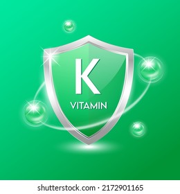 Vitamin K shield with green atom. Protect the body stay healthy. For nutrition products food. Medical scientific concepts. Vector illustration.