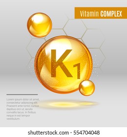 Vitamin K1 gold shining pill capcule icon . Vitamin complex with Chemical formula, Phylloquinone, menaquinones. Shining golden substance drop. Meds for heath ads. Vector illustration