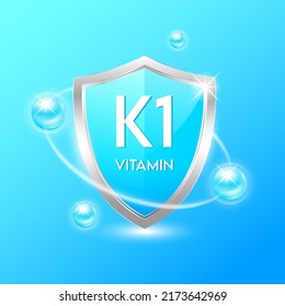 Vitamin K1 shield with blue atom. Protect the body stay healthy. For nutrition products food. Medical scientific concepts. Vector illustration.