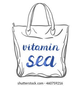 Vitamin sea. Brush hand lettering. Handwritten words on a sample tote bag. Great for beach tote bags, swimwear, holiday clothes, and more.