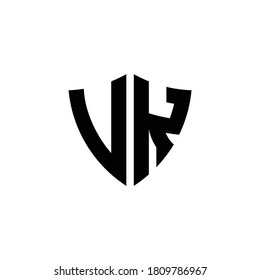 VK monogram logo with shield shape design template isolated on white background