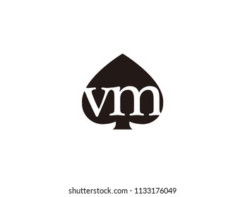 The vm initials logo inside the black shovel