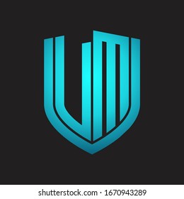 VM Logo monogram with emblem shield design isolated with blue colors on black background