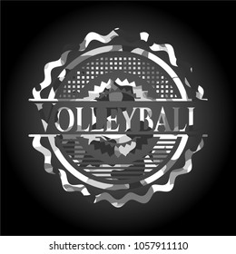 Volleyball on grey camouflaged pattern