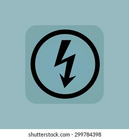Voltage lightning in circle, in square, on pale blue background