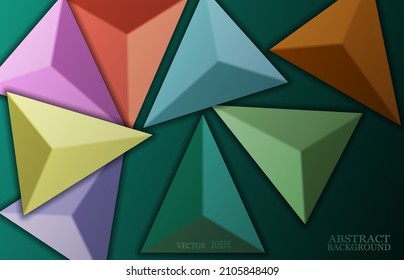 Volumetric colored triangles on a green background.