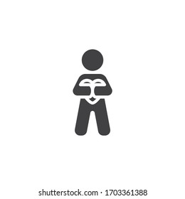 Volunteer man vector icon. filled flat sign for mobile concept and web design. Man holding heart glyph icon. Symbol, logo illustration. Vector graphics
