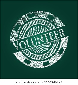 Volunteer on chalkboard