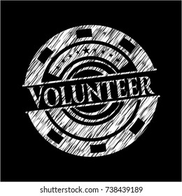 Volunteer on chalkboard