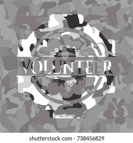 Volunteer on grey camo texture