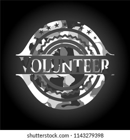 Volunteer on grey camouflaged pattern