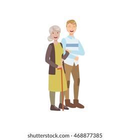 Volunteer Walking an Old Lady With a Cane