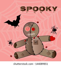 Voodoo doll with spider-web bat and spider